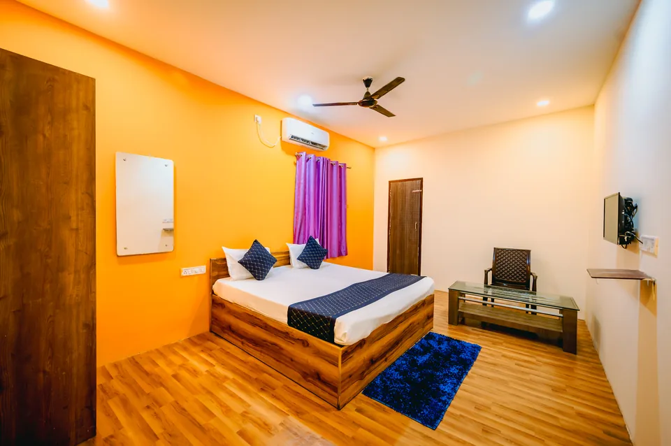 Family AC Room bed and TV wall