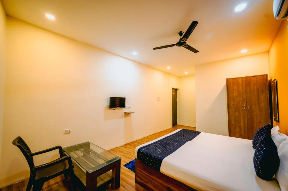 Family AC Room seating area at Hotel Laughing Buddha 2